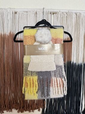 Multicoloured scarf and cream beanie set; brand new in original packaging